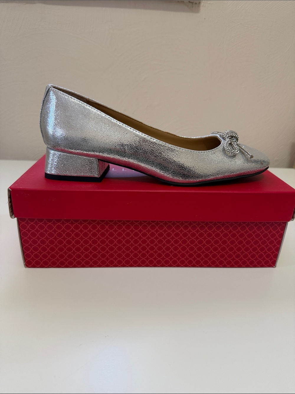 Kelly & Katie Metallic Silver Pumps with Crystal Bow Accent